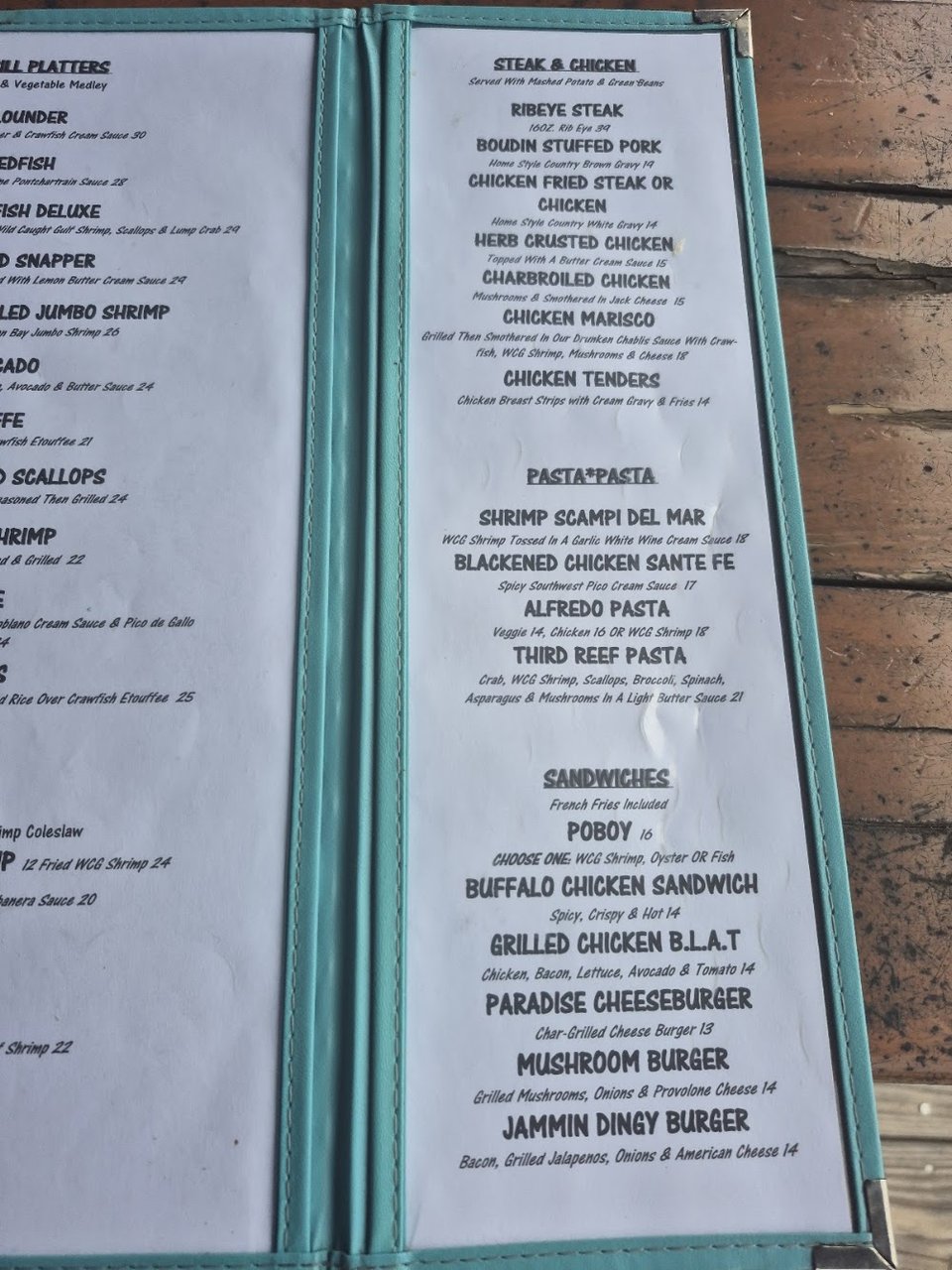 Restaurant menu showing steak and chicken categories.
